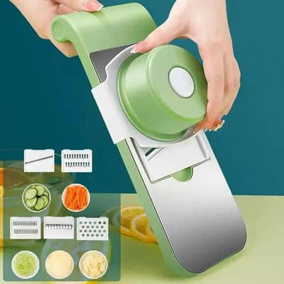 Multi blade vegetable slicer with ABC plastic handle