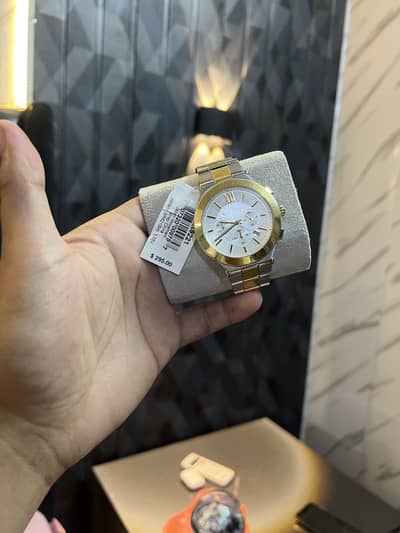 One men & one women brand new  Michael Kors watches