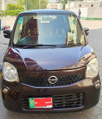 Nissan Moco. 660 cc. . Top of the Line.