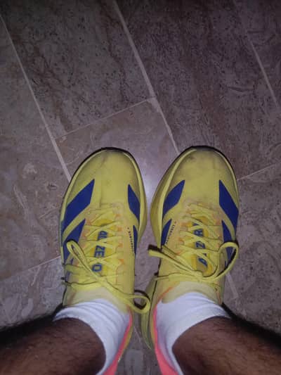 ADIZERO LIGHTSRTIKE PRO IN GOOD CONDITION