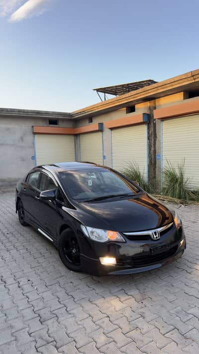 Honda reborn 2009 full option total genuine like new car Lahore reg