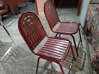 4 chairs maroon colour in used condition