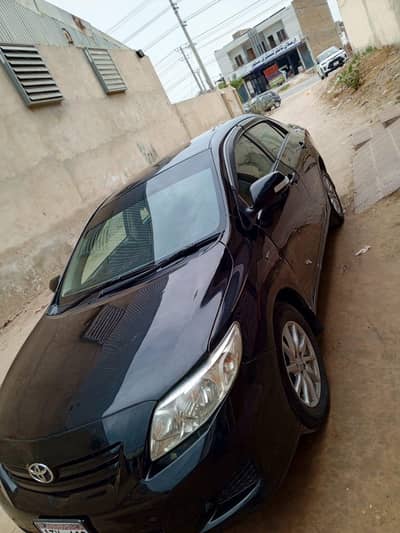 black colour Corolla XLI convert GLi vd beautiful alloy Rims