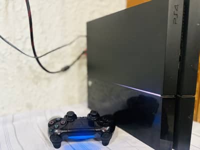 PlayStation 4 Fat with controller