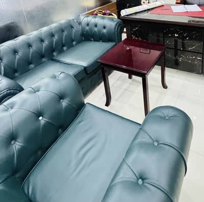 Branded leather sofa set for sale with Table slightly used