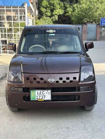 Nissan pino 2009 model 12 import