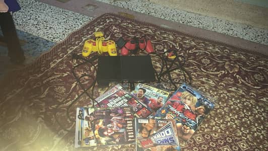 Playstation 2 jailbroken with 2 controllers & 2 usb filled with games