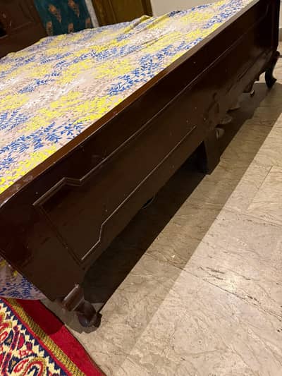 solid old original wood bed