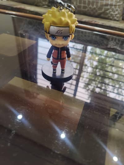 Naruto action figure with kakashi bell