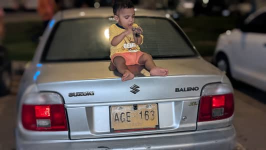 Pick and drop in baleno 1300 cc neat and clean car