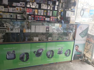 Mobile Shop Setup for Sale – Racks & Counter (Good Condition