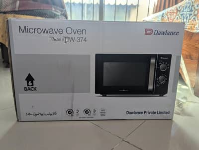 BRAND NEW DAWLANCE MICROWAVE ( never used)