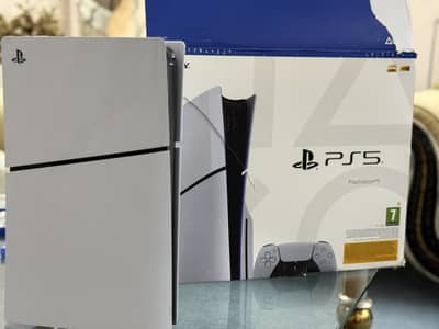 Playstation5 slim 1 TB (disc edition) with 5 cds . Only 3months used