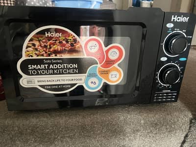 Haier band new microwave