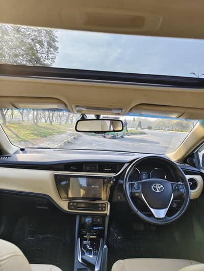 Toyota Corolla Altis grande beige interior