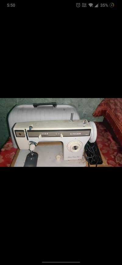 Singer old model sewing machine