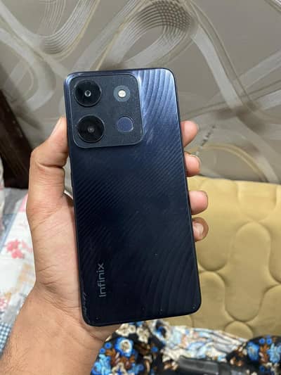 Infinix smart 7 4/64 gb box ha WhatsApp 03098030380