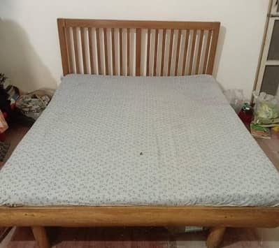 Solid Wooden Bed – Strong & Durable (Urgent Sale)