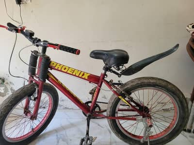 phonix boy bicycle in red colour