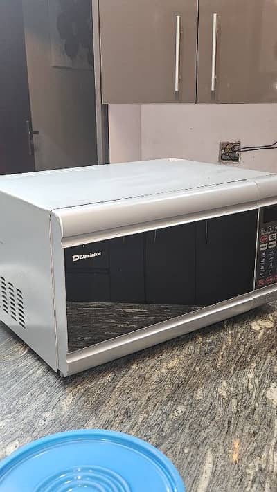 Dawlance Model # DW-105-G  Microwave Oven  very good condition