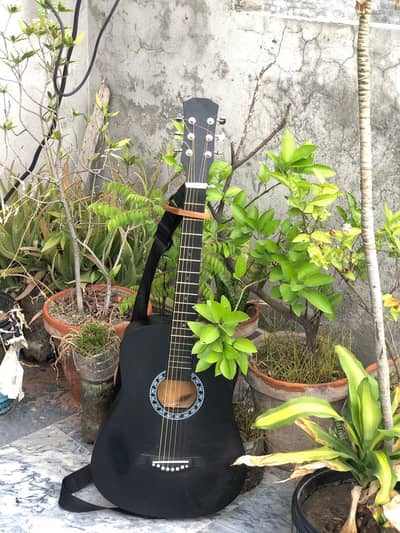 black acoustic guitar