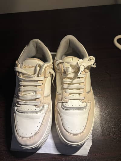 Orignal outfitters sneakers peach colour almoy brand new condition