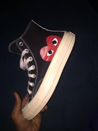 Comme des Garçons Play x Converse Chuck 70 High Top sneakers in black.