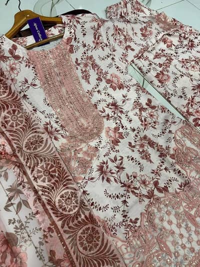 3 pcs woman's stitched lawn printed suit  good quality