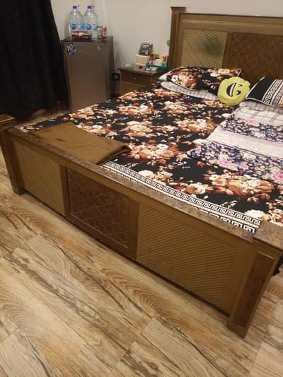 Fancy Wooden/Ply Double Bed , side tables and wooden rack for sale