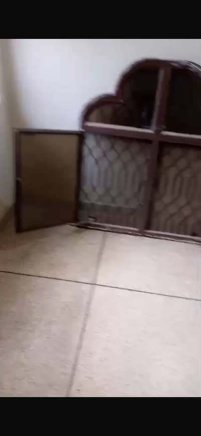 Window with grill and glass