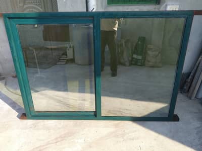 Iron Sliding Window With Green Mercury Mirror Home Used For Sale.
