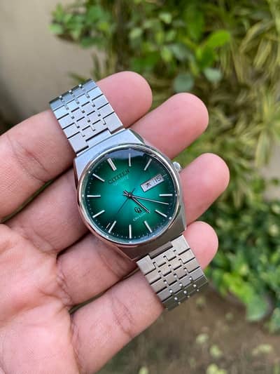Original citizen green dial originality guaranteed