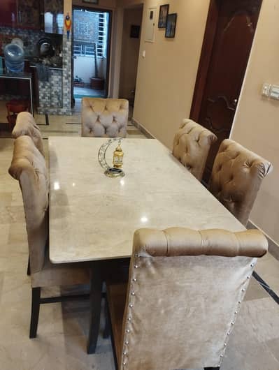 Marble top and 6 fomic chairs