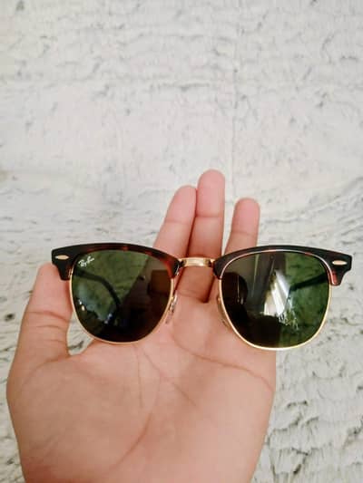 Ray-Ban Clubmaster Classic (RB3016) sunglasses.