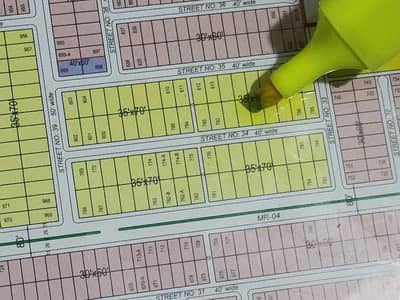 10 Marla Residential Plot Available For Sale in Faisal Town F-18 Islamabad.