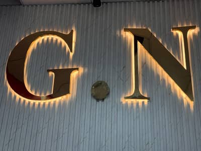 G. N steel led light logo