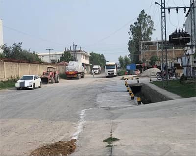 I-9 Main Road Building with Big Parking area Plot Size 4 Kanal with 2 Kanal Extra Land Total 6 Kanal area For Sale