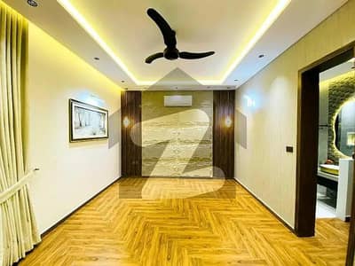 10 Marla House Available For Rent In Quaid Block Sector E Bahria Town Lahore