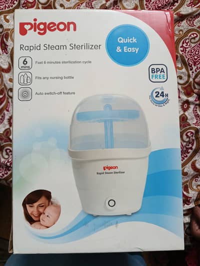 Baby feeder and bottle sterilizer brand new