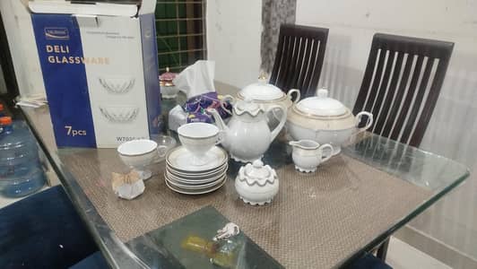 8 cups, saucers , kettle, etc