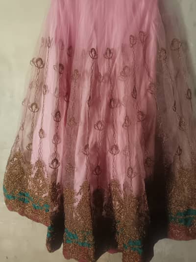 Pink Net Lehenga with Heavy Embroidery – Like New