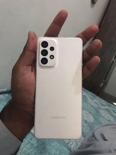 SAMSUNG A73 used with box and charger condition sides ruogh