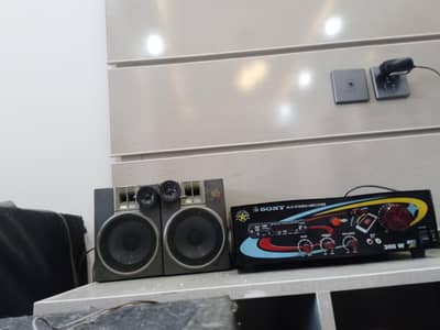 kenwood 3010 model or lg double magnet woofer +Amplifier+2 spekers bs