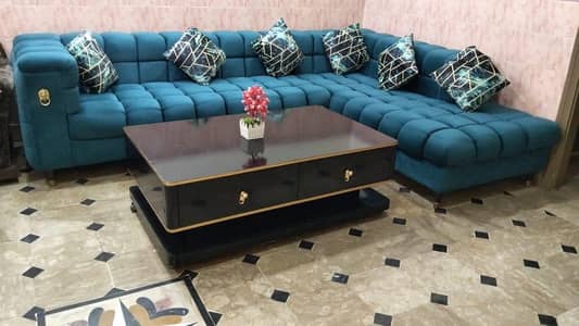 only one year used L shape sofa and center table for sale