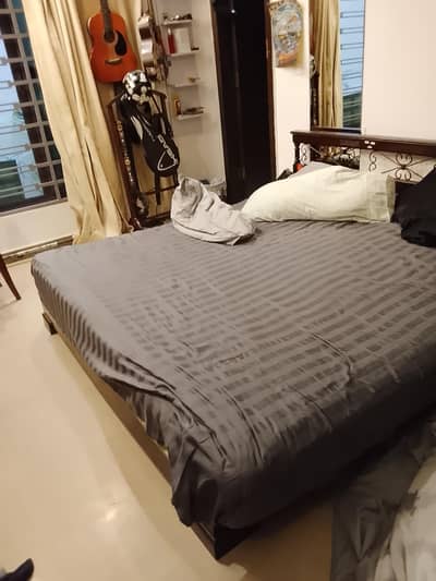 Wooden Wrought Iron King Bed with one side table mirror console table