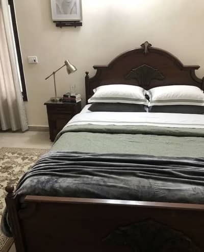 Wooden double bed