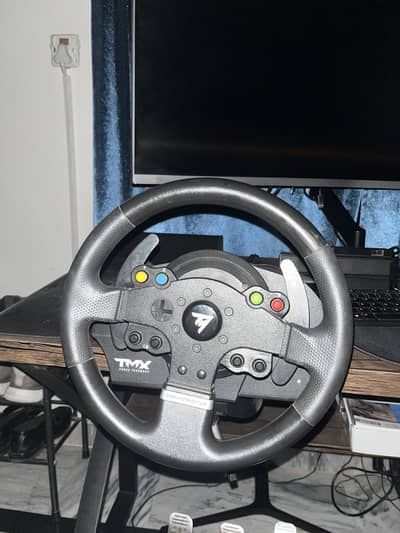 Thrustmaster TMX Pro steering wheel with pedals