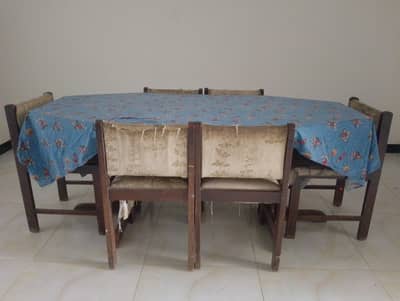 wooden table with 6 chairs available for sale