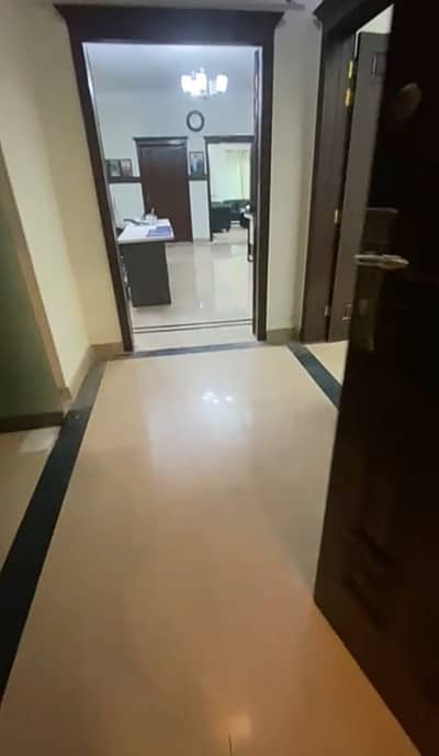 A large, non-furnished room is available for rent in a 3-bedroom flat at Al-Safa Heights 1, F-11 Markaz.