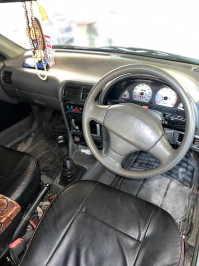 Car 10/9 body condition ac on hai aur lpg pa hai petrol pa be hai